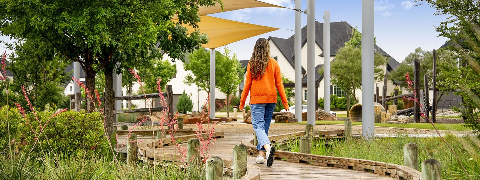Woman Walking On Trail