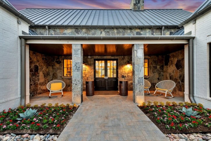 Entrance to Orchard House amenity center at The Grove Frisco in Texas