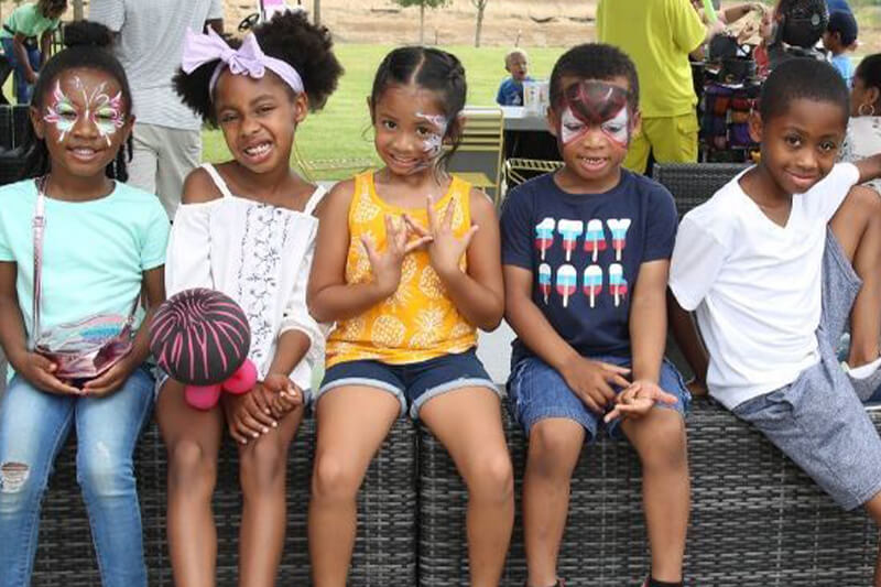Kids enjoying community event at The Grove Frisco | Frisco, Texas