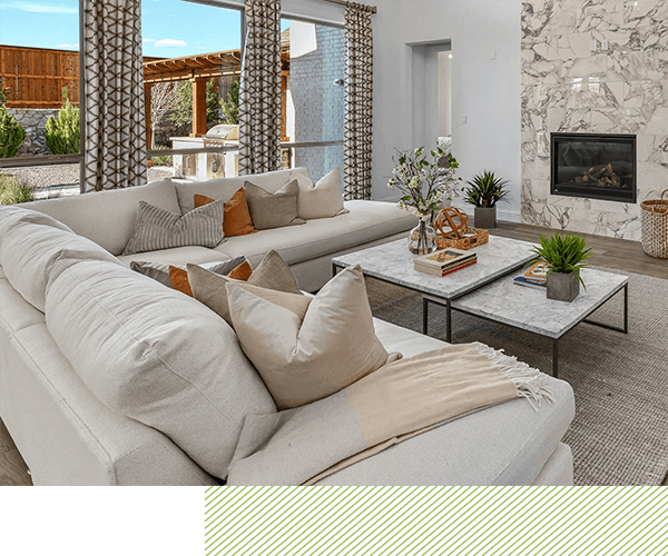 Living room in a new home at The Grove Frisco community Frisco, TX